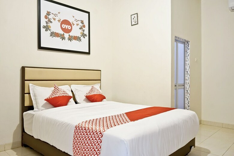 Hostal Oyo 1076 Dmc Homestay