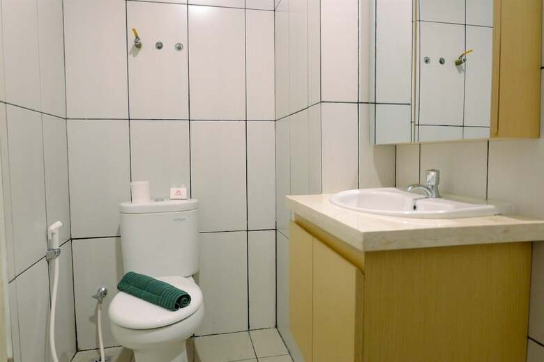 Homey Studio Apartment At Grand Kamala Lagoon