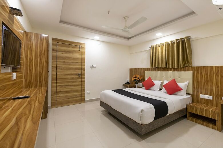 Hotel Capital O 49120 Ak International
