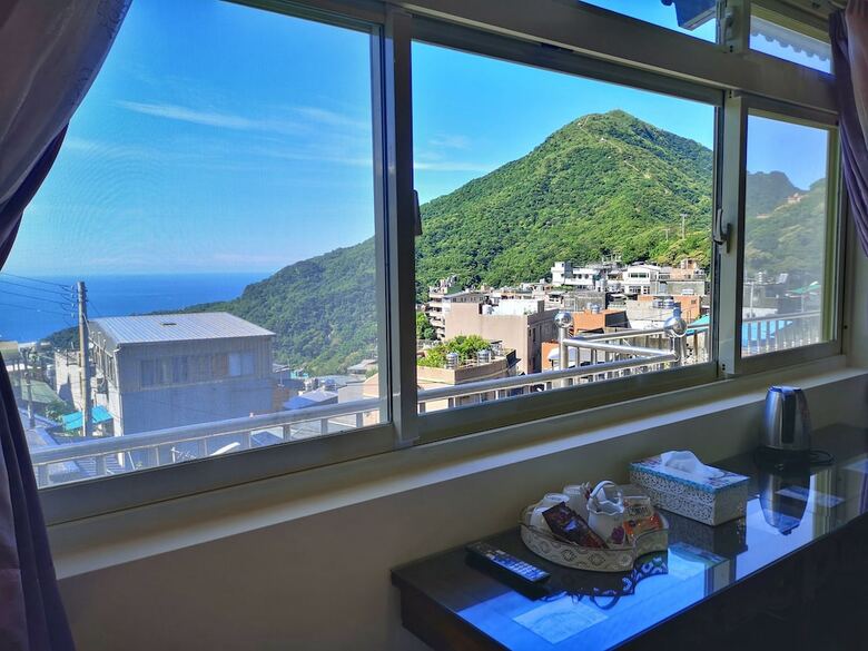 Hotel Qu Hi Home Stay