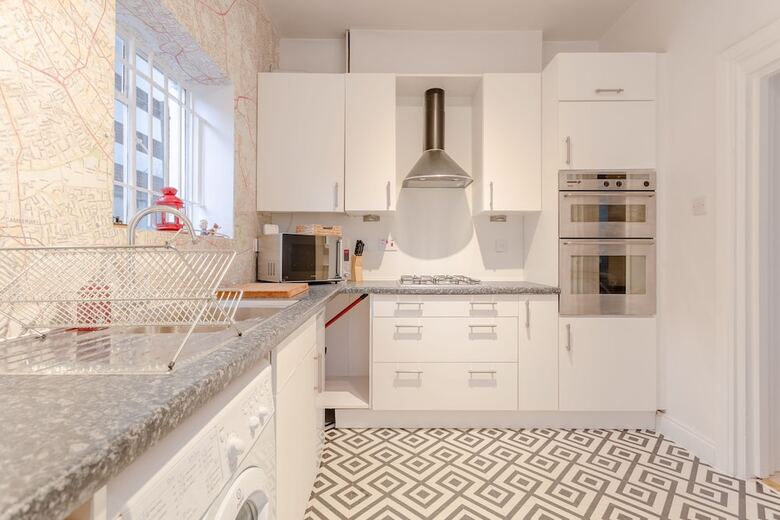 Elegant 2 Bedroom British Themed Apartment