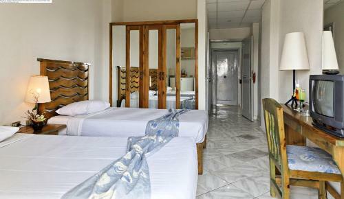 The Three Corners Triton Empire Hotel