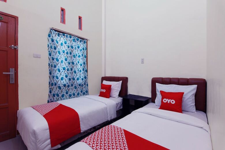 Hotel Oyo 1440 New Sejarah