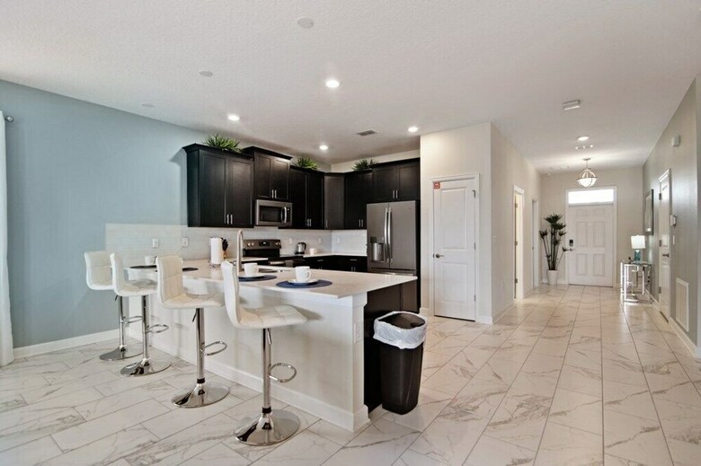 Champions Gate 8830 - Eight Bedroom Pool Home