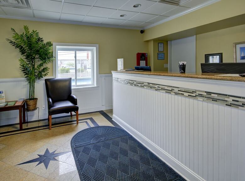 Apartamento Coastal Palms Inn & Suites