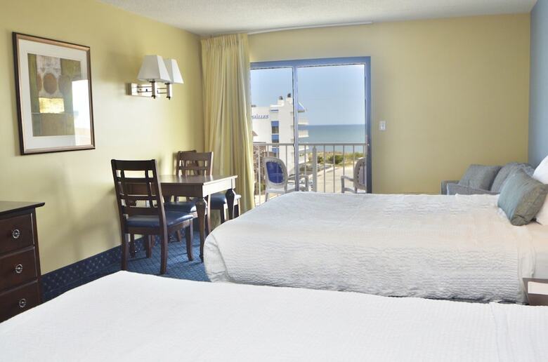 Apartamento Coastal Palms Inn & Suites