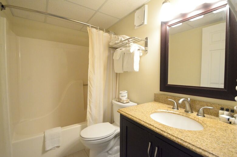Apartamento Coastal Palms Inn & Suites