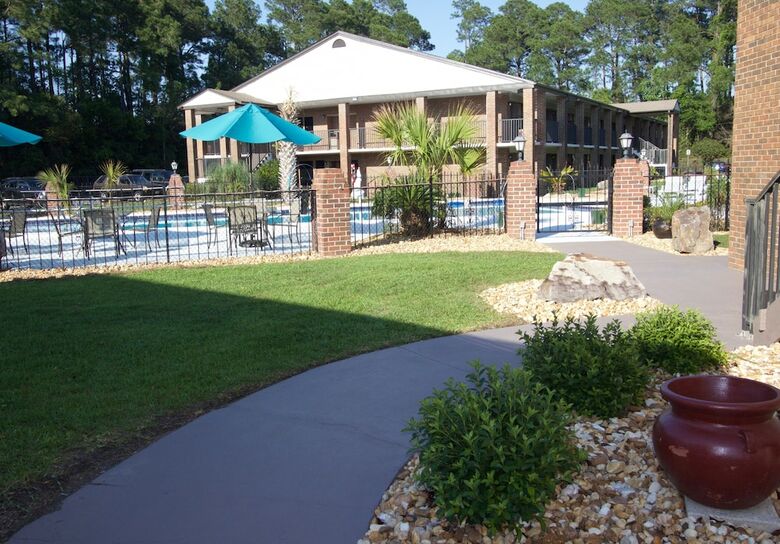 Hotel At Home Inn & Suites