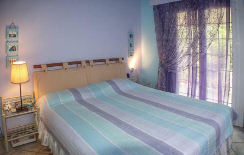 Three-bedroom Holiday Home In Artemida
