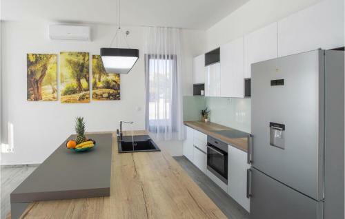 Four-bedroom Holiday Home In Kucine