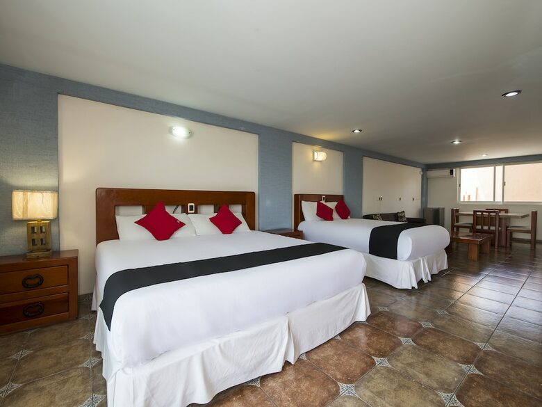 Hotel Capital O Suites de Reyes