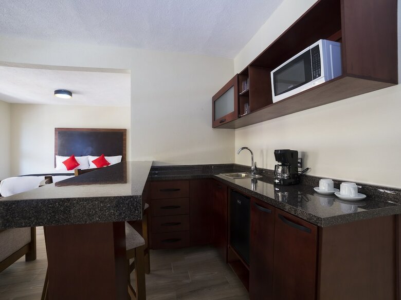 Capital O Hotel Colonial Acopinalco Inn