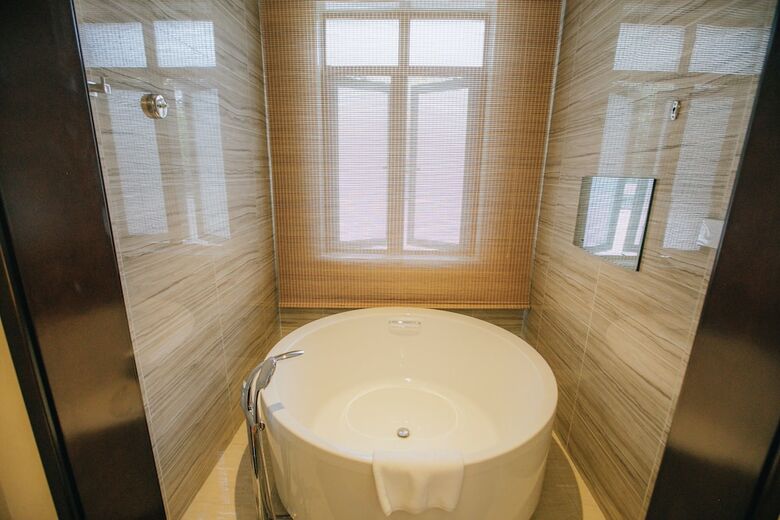 Riad Xinhualian Lv Xin Gu Hotel