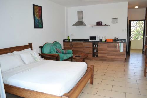 Aparthotel Cowrie Shell Beach Apartments