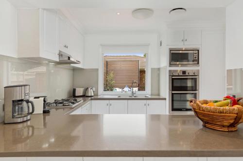 Coastal, Family-sized Getaway In Beachside Locale
