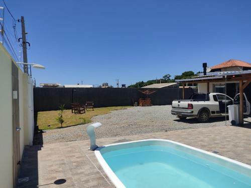 Linda Casa Com Piscina Em Itajub� A 1000mt Da Praia.