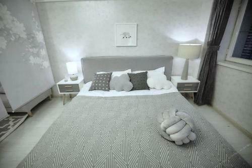 Apartamento Xinjinshan Yijia Condo Hotel
