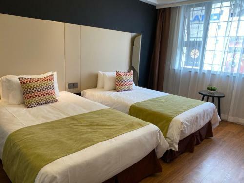 Kangbo Hotel Hanzhong Qiaobei Square