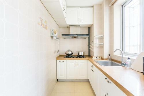 Hotel Qingdao Shinan�wusi Square�
