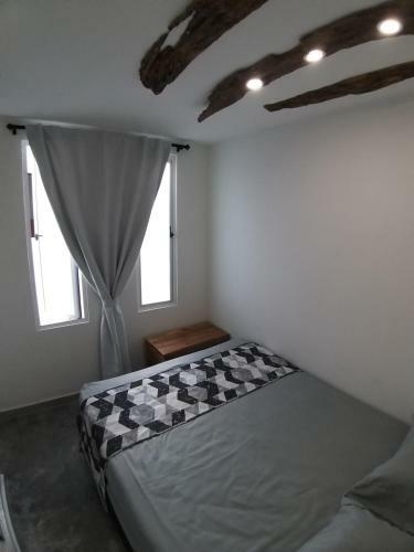 Farallones Apartahotel - Betania
