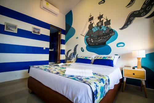 Casa Del Puerto Hostel & Suites