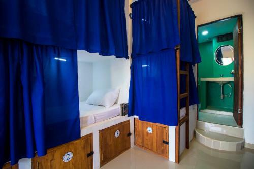 Casa Del Puerto Hostel & Suites