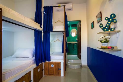 Casa Del Puerto Hostel & Suites
