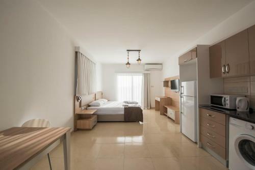 Apartamento Deniz Airport Suites