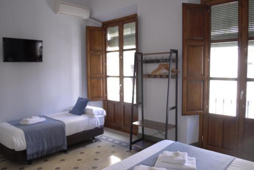Hostal La Perla Granada Suites