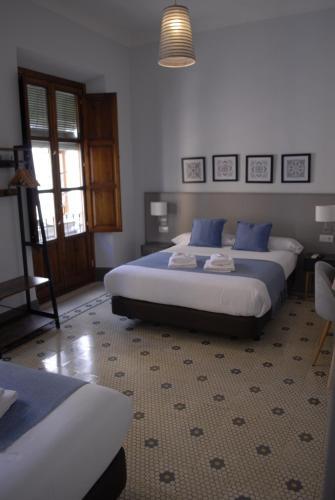 Hostal La Perla Granada Suites