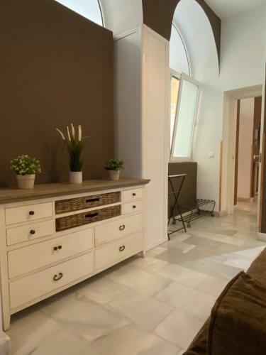 Apartamento Suites Plaza de Los Refinadores, Maestranza