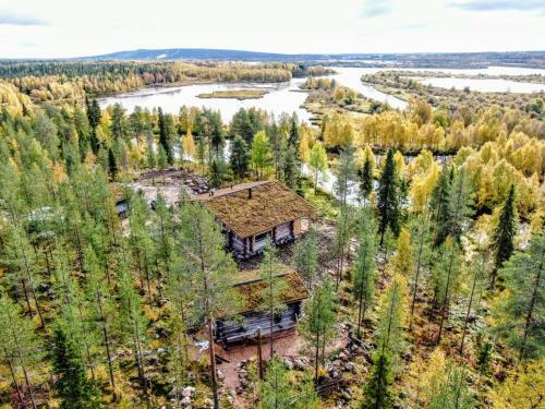 Log Cabin In Lapland By The River