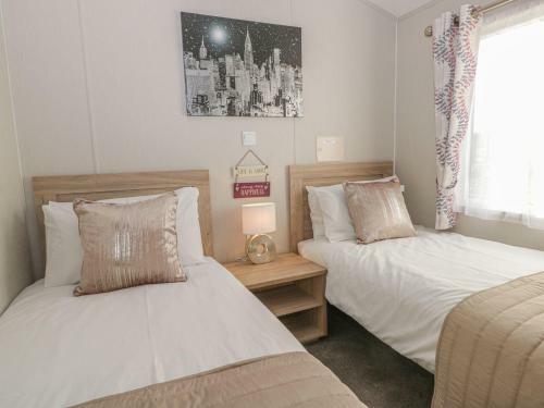 Stylish Lodge Set In The Sand Le Mere Holiday Park