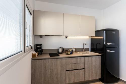 Apartamento Thira Gold Suites