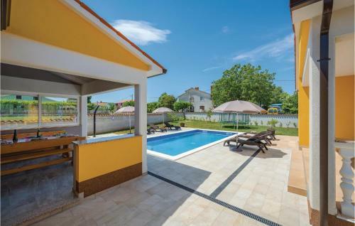 Three-bedroom Holiday Home In Labin