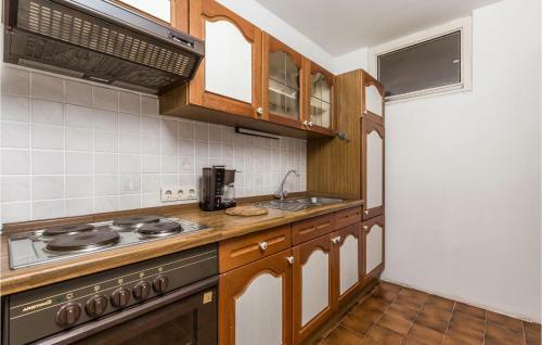 Four-bedroom Holiday Home In Lovran