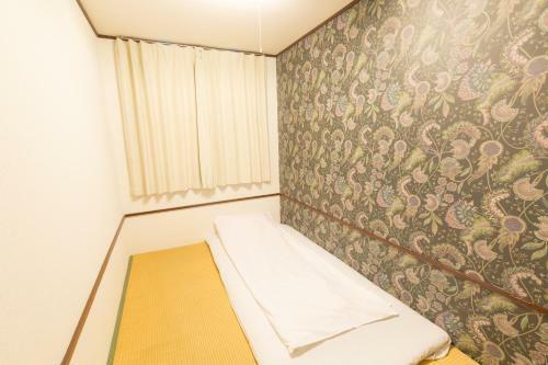 Albergue Backpackers Hotel Toyo