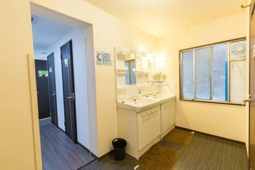 Albergue Backpackers Hotel Toyo