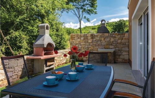 Four-bedroom Holiday Home In Putini