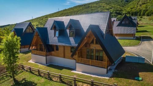 Wooden Houses Macola