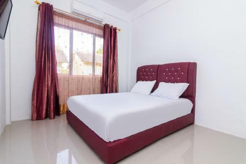 Hotel Oyo Life 2672 Athaya Kost