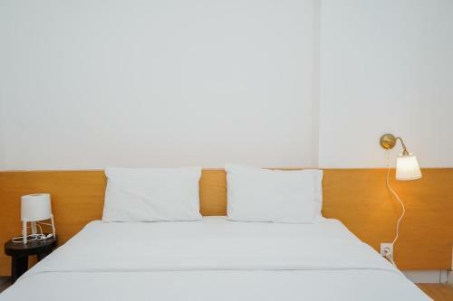 Relax And Comfy @ Studio Casa de Parco Apartment By Travelio