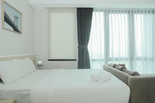 Comfortable Studio Room At Capitol Suites Apartment By Travelio