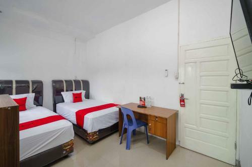 Hostal Reddoorz Syariah Near Stasiun Kereta Api Kisaran