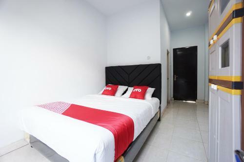 Hotel Oyo 2566 Putri Kesia Rooms