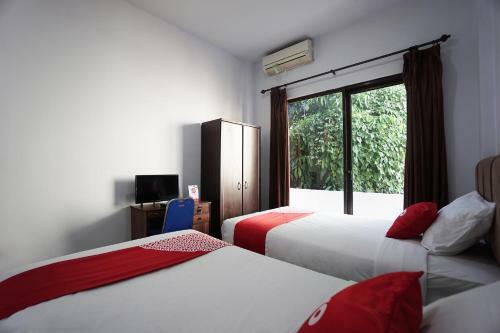Hotel Oyo 2566 Putri Kesia Rooms
