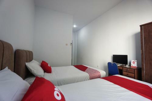 Hotel Oyo 2566 Putri Kesia Rooms