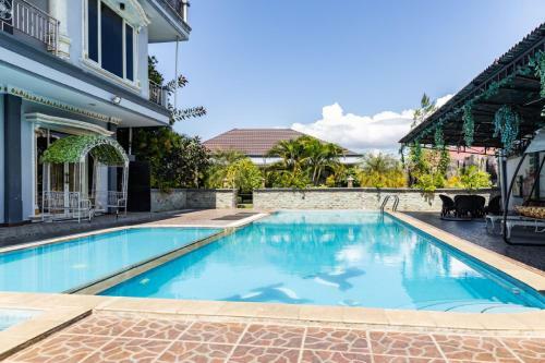 Hostal Reddoorz Premium @ Sea Residence Manado