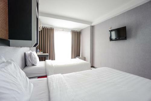 Capital O 3433 Hotel Plaza
