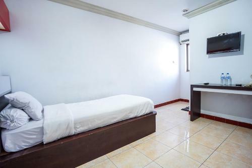 Capital O 3433 Hotel Plaza